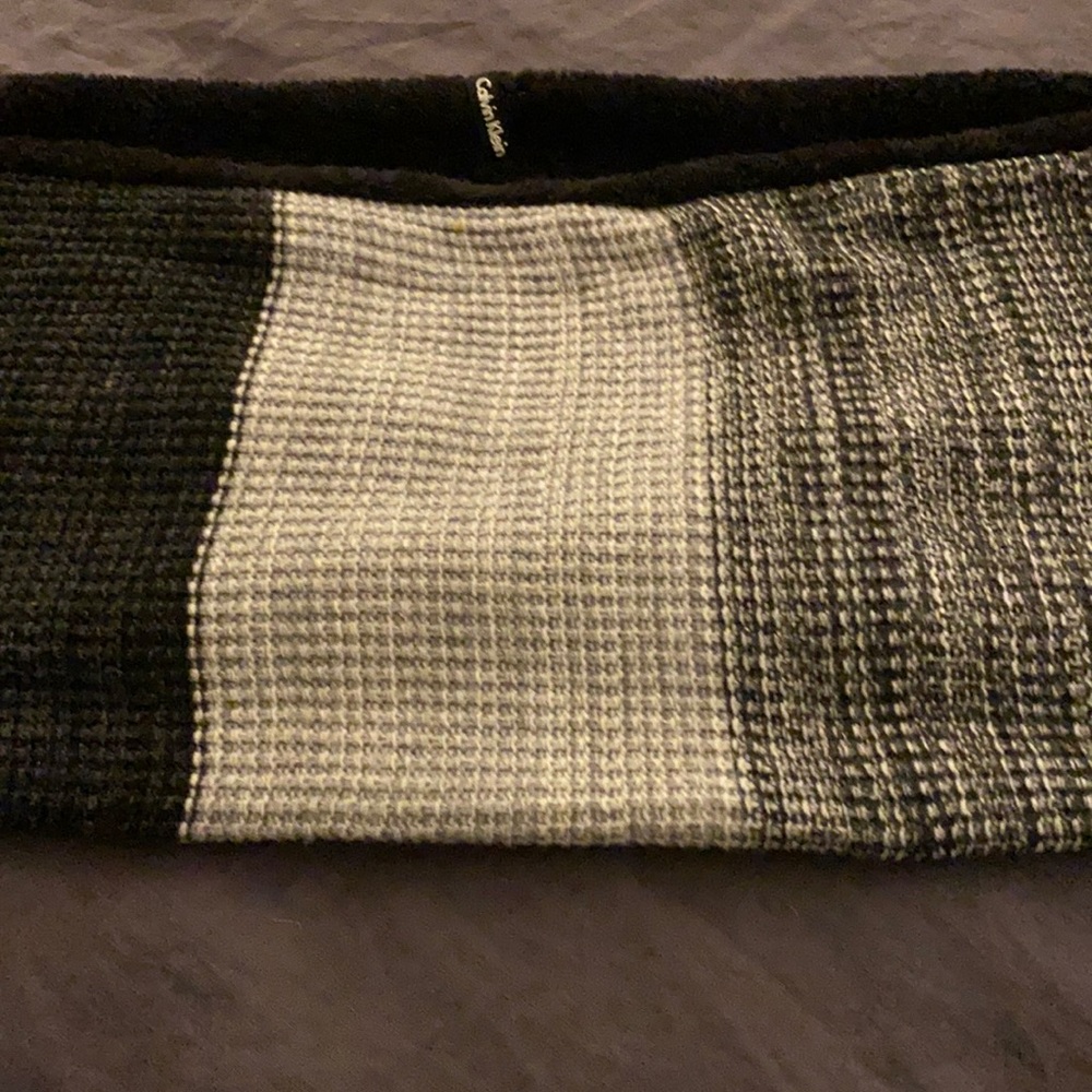 CK scarf. One side black, other a mix of grays.
